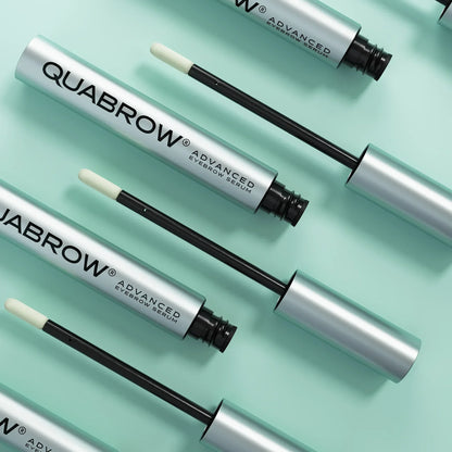 Multiple QUABROW Advanced Eyebrow Serum tubes from the Trio Set displayed on a mint green background
